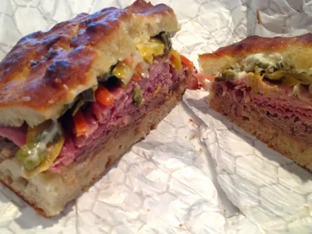 In this image we can see food items on a paper.