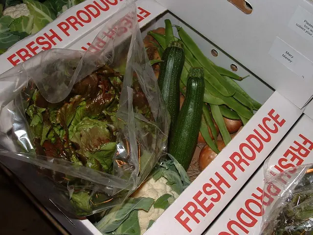 In this image we can see leafy vegetables kept in the cover, cauliflower, peas, onions and some...