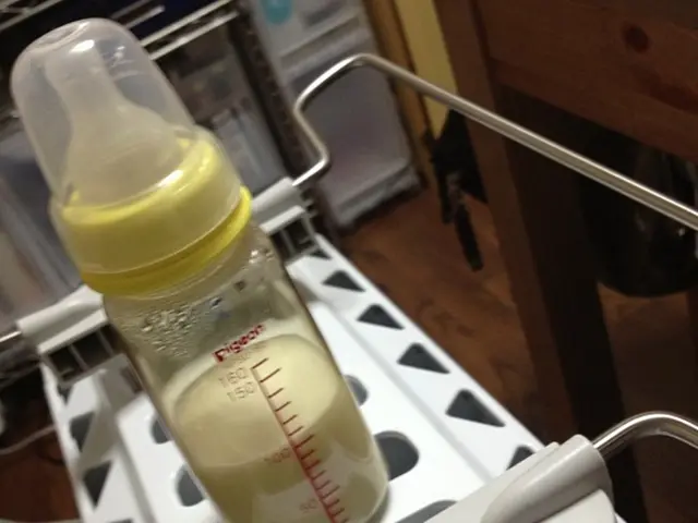 In this image I can see a milk bottle.